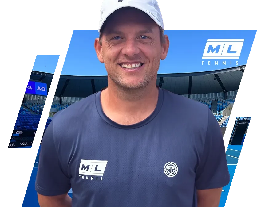 Smiling tennis coach wearing blue ML Tennis shirt and white cap