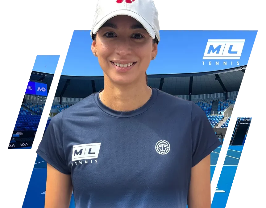 Smiling woman in white cap and blue ML Tennis t-shirt on tennis court