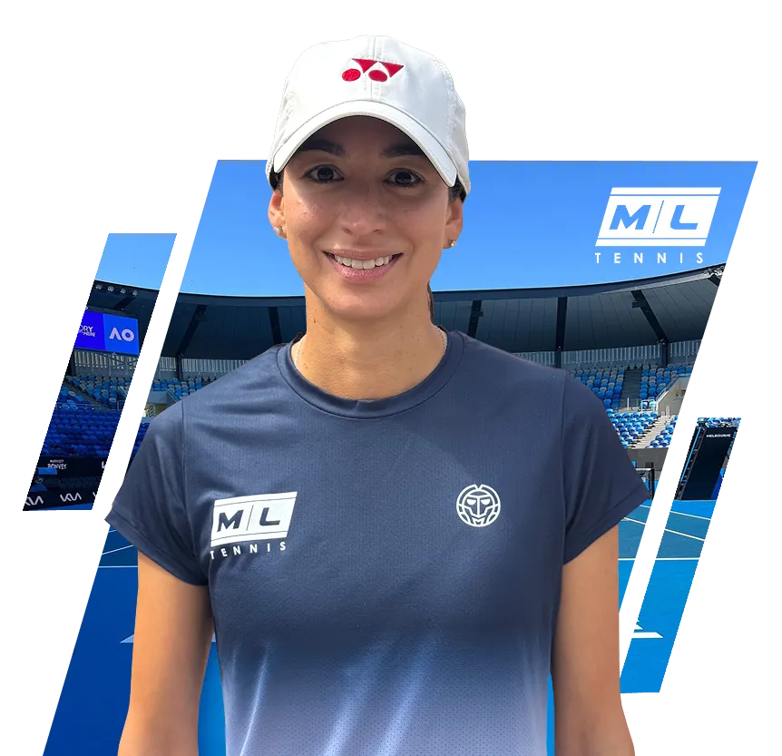 Smiling woman in white cap and blue ML Tennis t-shirt on tennis court