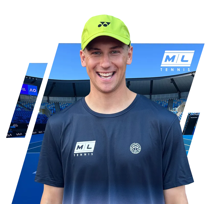Smiling young man wearing a neon yellow Yonex tennis cap and an ML Tennis branded shirt in a large tennis stadium with blue s
