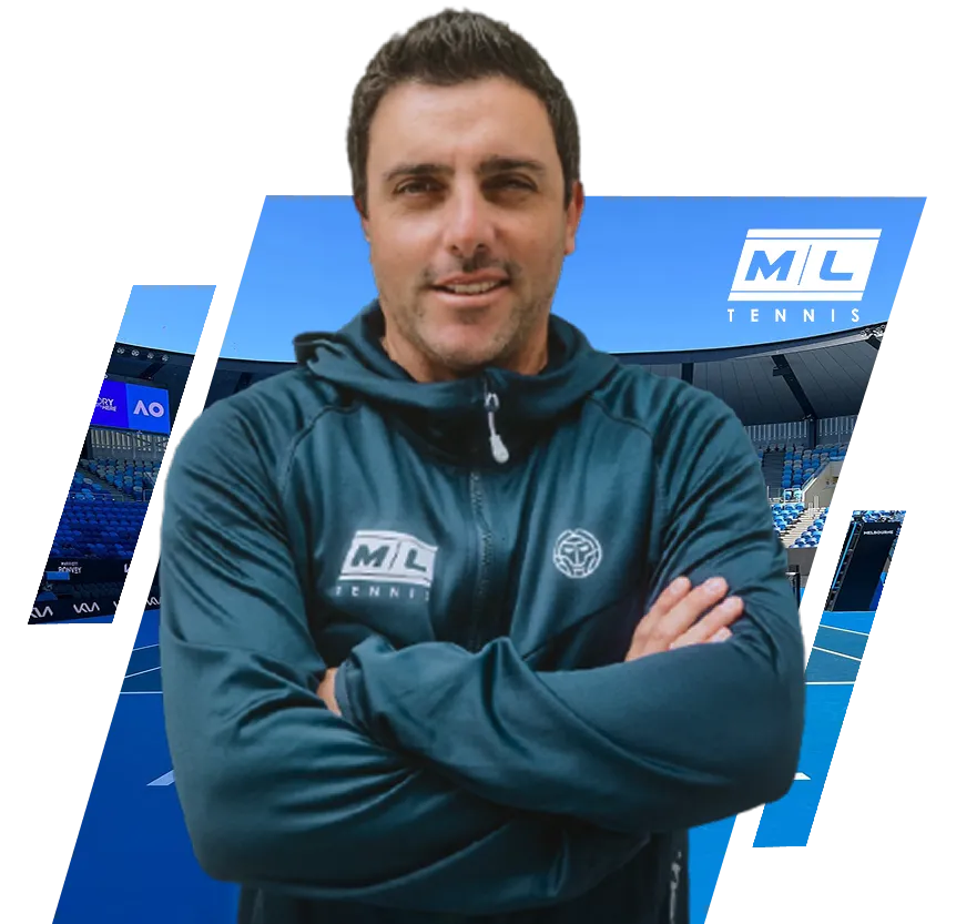 Man in blue ML Tennis jacket standing with arms crossed on tennis court